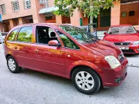 Usado Opel Meriva Cosmo 105 CV (77 kW) 2006 Granate Monovolumen