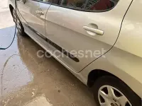 Usado Peugeot 308 Business-Line 92 CV (67 kW) 2011 Gris / plata Berlina