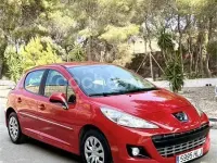 Usado Peugeot 207 70 CV (51 kW) 2012 Rojo Berlina