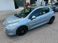 Usado Peugeot 207 75 CV (55 kW) 2010 Azul Berlina