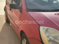 Usado Ford Fiesta Trend 100 CV (73 kW) 2003 Rojo Utilitario