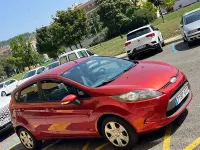 Usado Ford Fiesta Trend 82 CV (60 kW) 2010 Naranja Berlina