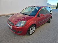Używany Ford Fiesta Ghia 68 KM (50 kW) 2006 Czerwony Hatchback