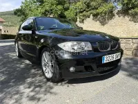 Usado BMW 116 115 CV (84 kW) 2009 Negro Utilitario