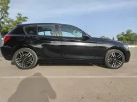 Usado BMW 116 136 CV (100 kW) 2012 Negro Utilitario