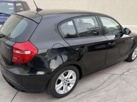 Usado BMW 116 122 CV (89 kW) 2010 Negro Utilitario