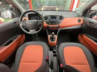 Używany Hyundai i10 67 KM (49 kW) 2014 Czerwony Hatchback