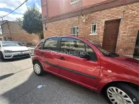 Usado Citroën C3 61 CV (44 kW) 2005 Rojo Berlina