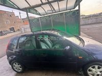 Usado Ford Fiesta Ghia 68 CV (50 kW) 2003 Negro Utilitario