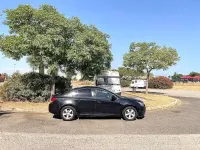 Usado Chevrolet Cruze LT 124 CV (91 kW) 2012 Negro Berlina