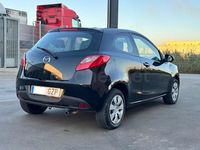 Usado Mazda 2 Active 86 CV (63 kW) 2010 Negro Utilitario