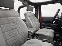 Usado Jeep Wrangler Sahara 200 CV (147 kW) 2016 Granate SUV