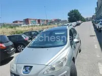 Usado Peugeot 308 90 CV (66 kW) 2010 Gris / plata Berlina