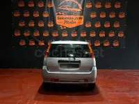 Usado Suzuki Ignis 69 CV (50 kW) 2004 Gris / plata Utilitario