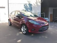 Usado Ford Fiesta Trend 70 CV (51 kW) 2011 Granate Berlina
