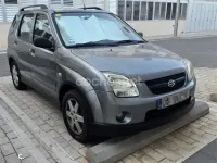 Usado Suzuki Ignis 69 CV (50 kW) 2006 Gris / plata Utilitario