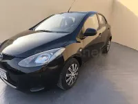Usado Mazda 2 Active 68 CV (50 kW) 2008 Negro Utilitario