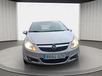 Usado Opel Corsa 86 HP (63 kW) 2010 Cinzento Sedan