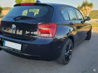 Usado BMW 116 122 CV (89 kW) 2012 Negro Utilitario