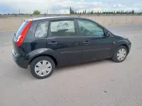 Usado Ford Fiesta Ambiente 70 CV (51 kW) 2007 Negro Utilitario