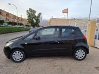 Usado Mitsubishi Colt Inform 75 CV (55 kW) 2006 Negro Berlina