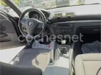 Usado BMW 118 143 CV (105 kW) 2009 Negro Utilitario