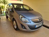 Usado Opel Corsa Expression 75 CV (55 kW) 2014 Gris / plata Utilitario