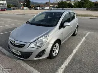 Usado Opel Corsa Selective 85 CV (62 kW) 2013 Plateado Utilitario