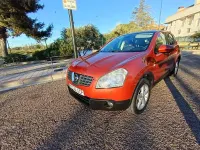 Używany Nissan Qashqai Acenta 150 KM (110 kW) 2009 Czerwony SUV