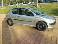 Usado Peugeot 206 70 CV (51 kW) 1998 Gris / plata Utilitario