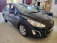 Usado Peugeot 308 Active 112 CV (82 kW) 2012 Negro Berlina
