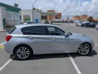 Usado BMW 118 Sport Line 136 CV (100 kW) 2018 Gris Utilitario