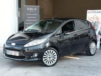 Usado Ford Fiesta Titanium 95 CV (69 kW) 2010 Negro Utilitario