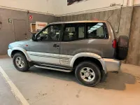 Usado Nissan Terrano SE 125 HP (91 kW) 1997 Cinzento SUV