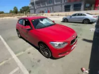 Usado BMW 116 116 CV (85 kW) 2013 Rojo Utilitario