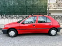 Usado Peugeot 306 71 CV (52 kW) 1995 Rojo Berlina