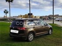Usado VW Touran Advance 150 CV (110 kW) 2016 Granate Monovolumen