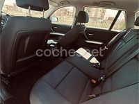 Usado BMW 318 143 CV (105 kW) 2011 Negro Familiar