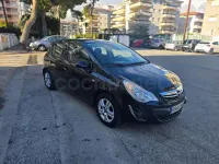 Usado Opel Corsa Selective 85 CV (62 kW) 2012 Negro Utilitario