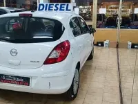 Używany Opel Corsa Expression 75 KM (55 kW) 2013 Biały Sedan/Limuzyna