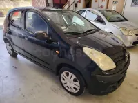 Usado Nissan Pixo Visia 68 CV (50 kW) 2012 Negro Utilitario