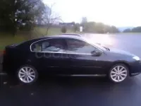 Usado Renault Laguna III Dynamique 150 CV (110 kW) 2008 Negro Berlina