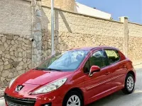 Usado Peugeot 207 70 CV (51 kW) 2012 Rojo Berlina