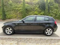 Usado BMW 120 150 CV (110 kW) 2004 Negro Utilitario