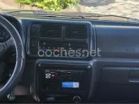 Usado Suzuki Jimny 80 CV (58 kW) 1999 Granate SUV