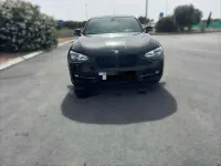 Usado BMW 118 M Sport 143 CV (105 kW) 2012 Negro Utilitario