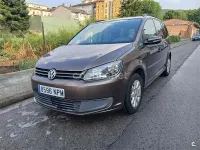 Usado VW Touran Advance 105 CV (77 kW) 2012 Granate Monovolumen