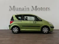 Usado Peugeot 1007 110 CV (80 kW) 2006 Verde Monovolumen