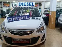 Używany Opel Corsa Expression 75 KM (55 kW) 2013 Biały Sedan/Limuzyna