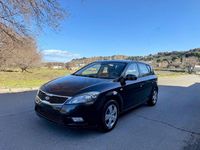 Usado Kia Ceed 90 CV (66 kW) 2011 Negro Utilitario